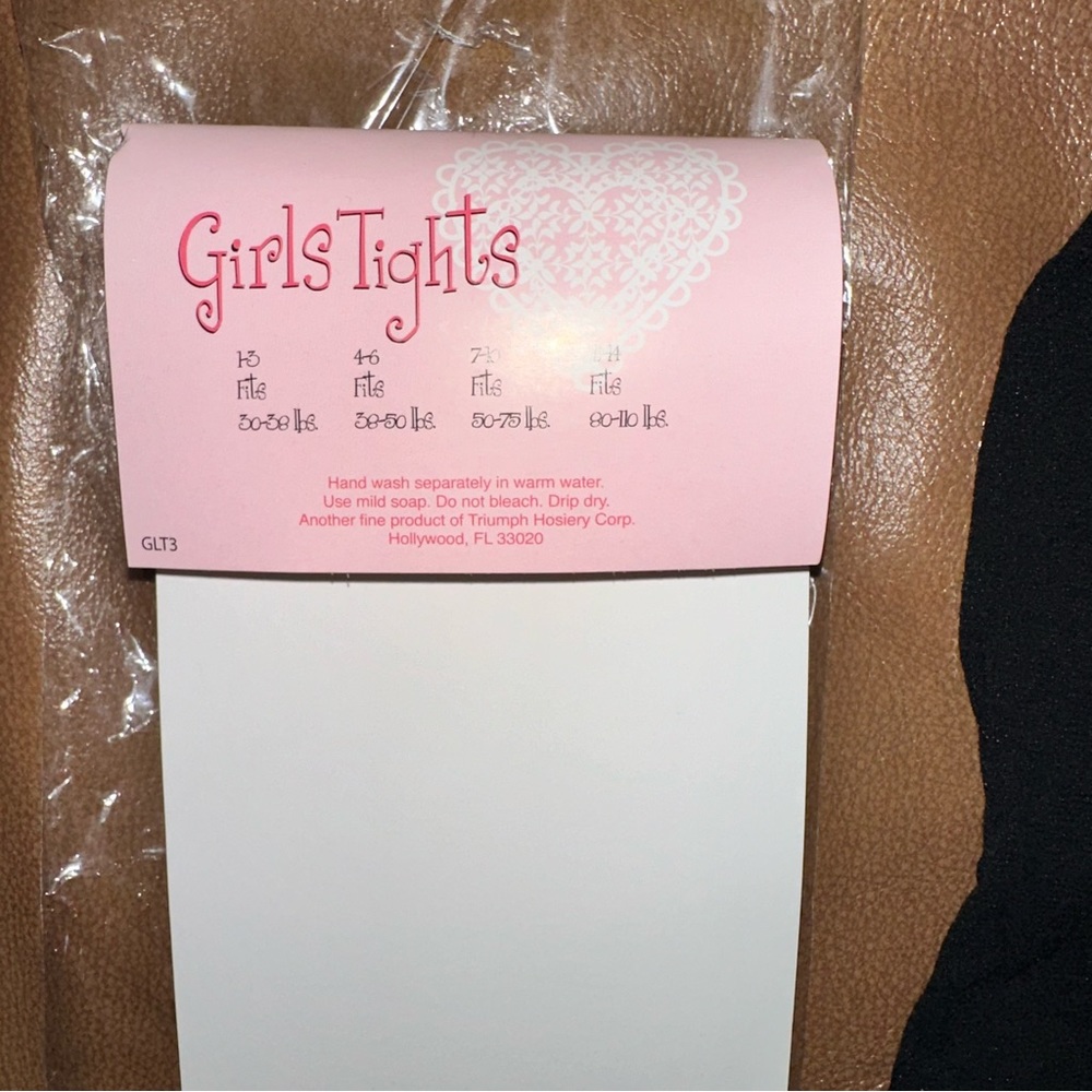 New in the package black tights. It says 12-14 (inseam 17”) - Picture 5 of 5